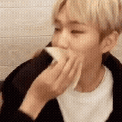 Person Holding Napkin To Face GIF