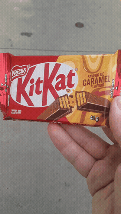 Person Holding Nestle KitKat Bar GIF