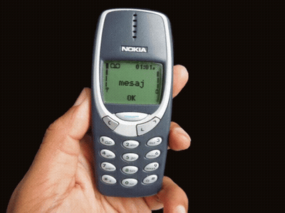Person Holding Nokia Cell Phone With Message GIF