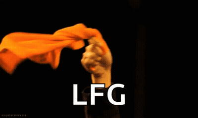 Person Holding Orange Cloth Saying LFG GIF