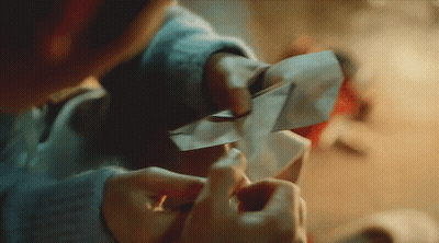 Person Holding Paper GIF