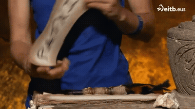 Person Holding Paper Saying Eitb.eus GIF