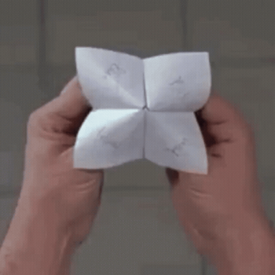 Person Holding Paper Saying Origami GIF