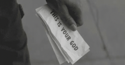 Person Holding Paper Saying This Is Your God GIF