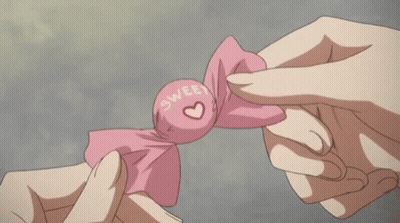 Person Holding Paper With Cartoon Character GIF