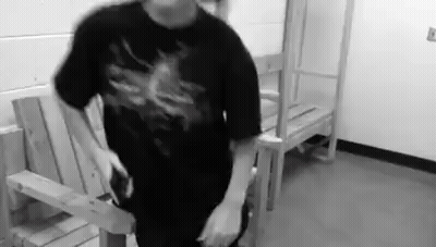 Person Holding Pen In Front Of Bright Light GIF