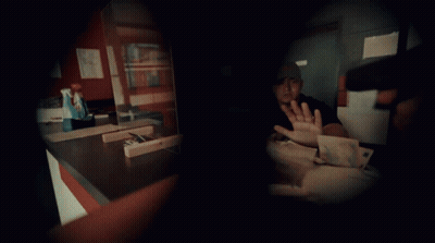 Person Holding Phone In Front Of Yamaha Microphone GIF