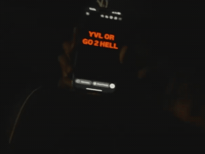 Person Holding Phone Saying Yvl Or Go2 Hell GIF
