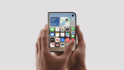 Person Holding Phone Showing 5:54 GIF