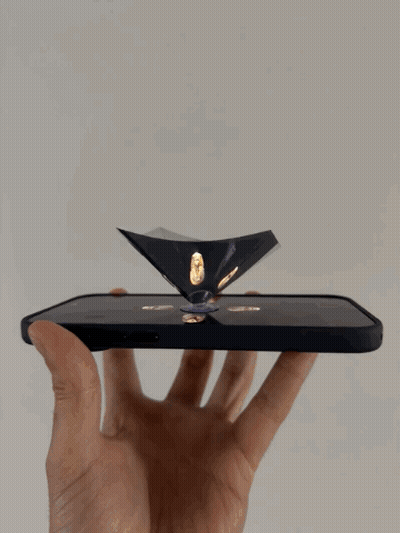 Person Holding Phone With Pyramid GIF