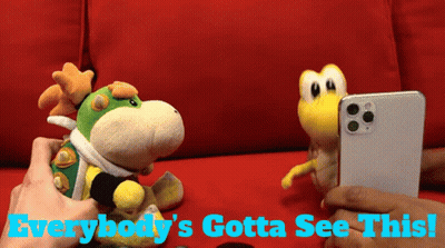 Person Holding Phone With Stuffed Animal Saying Everybody's Gotta See This GIF