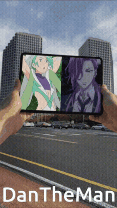 Person Holding Phone With Two Anime Characters Saying Dan The Man GIF