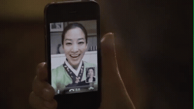 Person Holding Phone With Woman Picture GIF