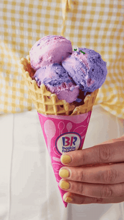 Person Holding Pink Cone With Purple Ice Cream GIF
