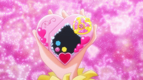 Person Holding Pink Heart On Purple Background GIF