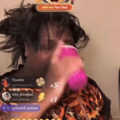 Person Holding Pink Object By Join My Fan Club Sign GIF