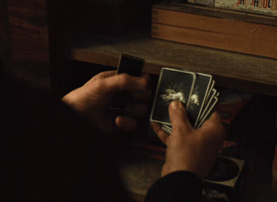 Person Holding Playing Cards GIF