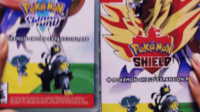 Person Holding Pokemon Sword And Shield Game GIF