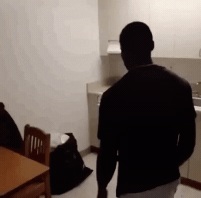 Person Holding Purple Object GIF