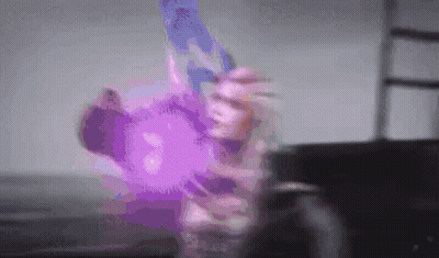 Person Holding Purple Object GIF