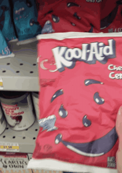 Person Holding Red Bag Of Kool Aid GIF