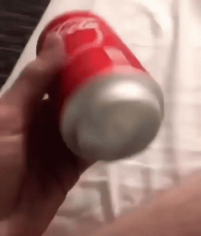 Person Holding Red Coca Cola Can GIF