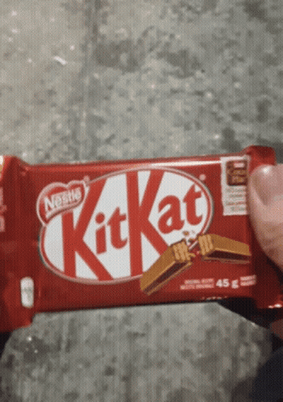 Person Holding Red KitKat Bar GIF