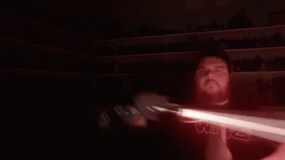 Person Holding Red Laser Beam GIF