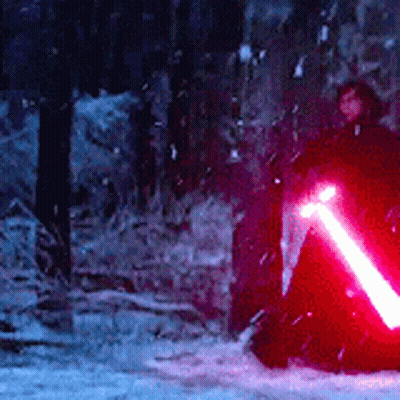 Person Holding Red Lightsaber In Snow GIF