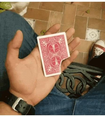 Person Holding Red Playing Card With Number 8 GIF