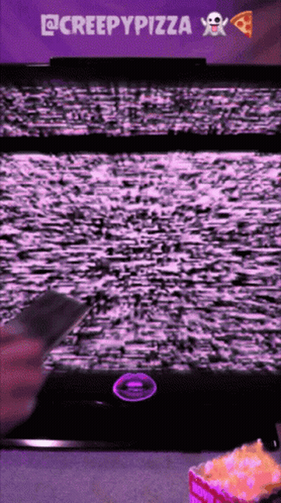 Person Holding Remote Control To TV Saying Creepypizza GIF
