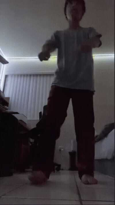 Person Holding Remote Control GIF