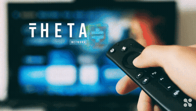 Person Holding Remote In Front Of TV Saying Theta Network GIF