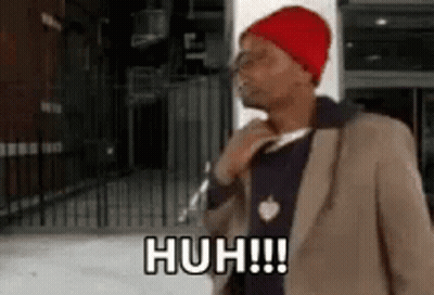 Person Holding Roast Beef Sandwich With Tomatoes And Cheese GIF