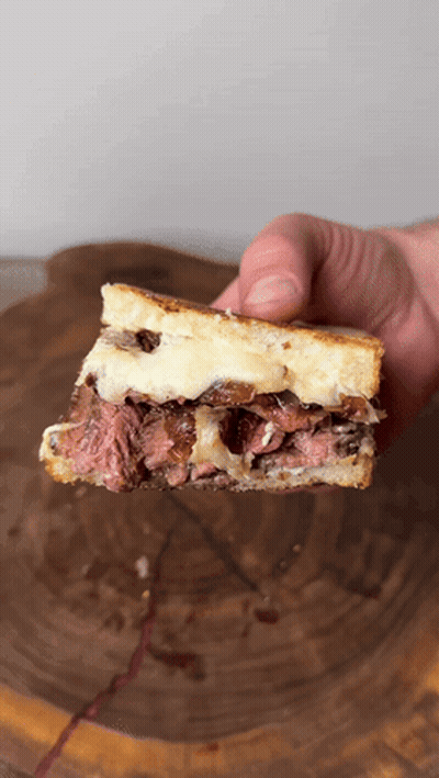 Person Holding Sandwich GIF