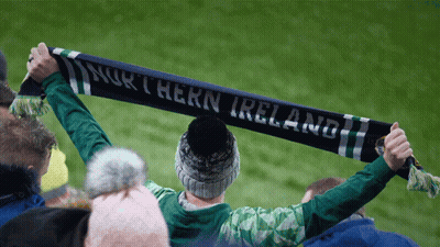 Person Holding Scarf Saying Northern Ireland GIF