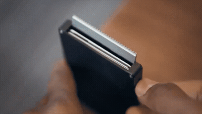 Person Holding Shaving Razor GIF