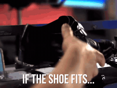 Person Holding Shoe Saying If The Shoe Fits GIF
