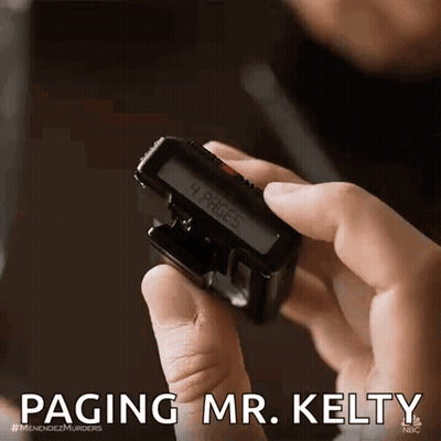 Person Holding Small Device With Pink Screen GIF
