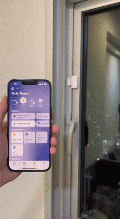 Person Holding Smartphone With Girls Room App Open GIF