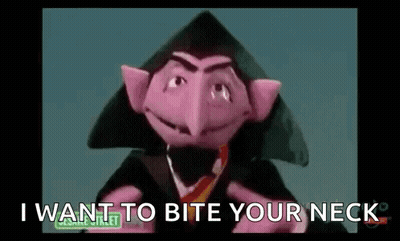 Person Holding Sony Controller GIF