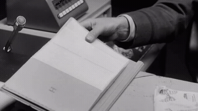 Person Holding Sorry Paper GIF