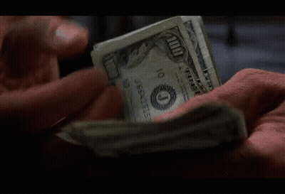 Person Holding Stack Of 100 Dollar Bills GIF