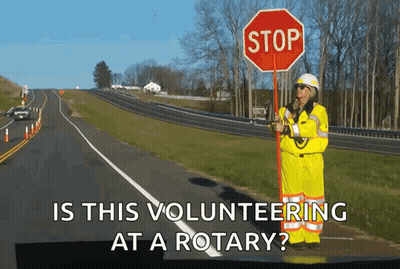 Person Holding Stop Sign GIF