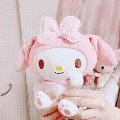 Person Holding Stuffed Animal GIF