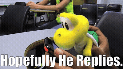 Person Holding Stuffed Animal Hoping He Replies GIF