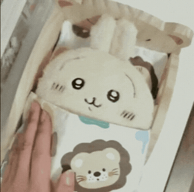 Person Holding Stuffed Animal With Lion On Head GIF