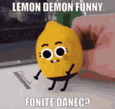 Person Holding Stuffed Lemon With Face And Legs GIF