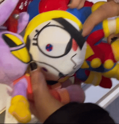 Person Holding Stuffed Robot GIF