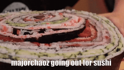 Person Holding Sushi Cake Saying Majorchaos Going Out For Sushi GIF